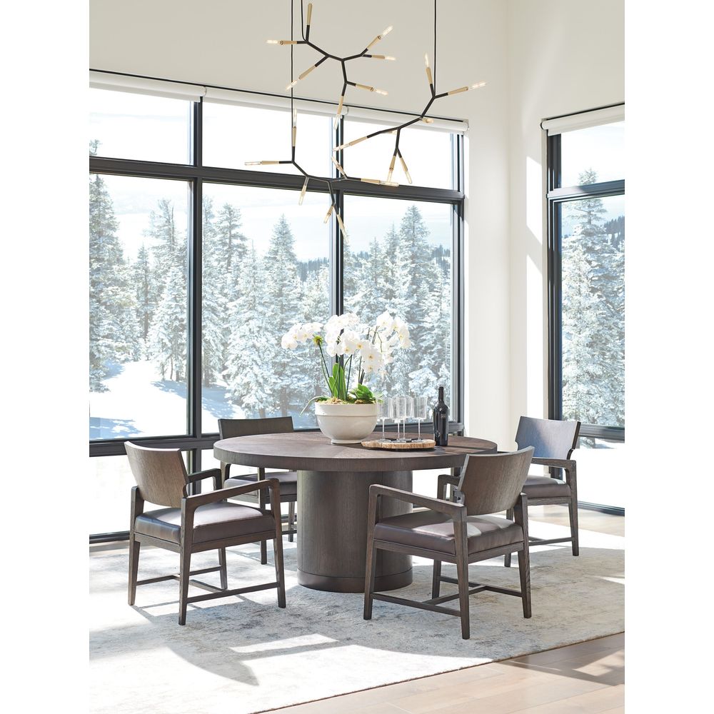 Additional view of Silvercreek Round Dining Table in dark brown and mocha, featuring a round dining surface.
