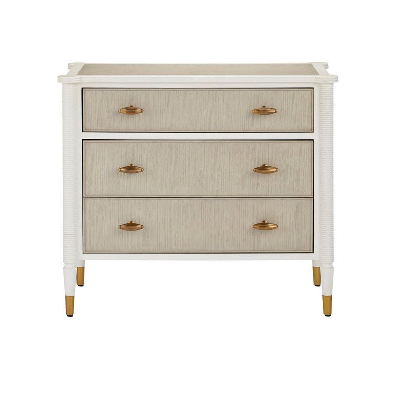 Aster Chest, shown in ivory white and light beige with wood, metal, and three full-width drawers.
