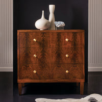 Pegano Bedside Chest, shown in warm medium-dark brown and rich mahogany brown with wood veneer and solid wood.