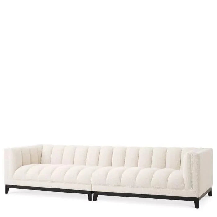 Sofa Ditmar, shown in cream and ivory with bouclé fabric, wood, and modular two-section configuration.