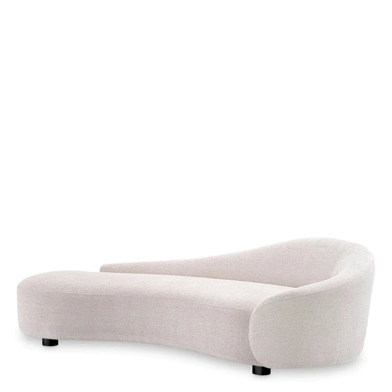 Sofa Rivolo, shown in cream and off-white with polyester fabric, upholstery foam, and fixed low cylindrical legs.
