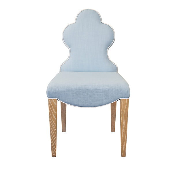 Adelaide Clover Back Dining Chair, shown in powder blue and light blue with fabric upholstery, wood, and armless.