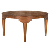 Davis Dining Table, shown in medium brown and warm amber-brown with teak wood, solid wood, and fixed round dining surface.
