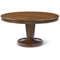 Haddon Round Dining Table, shown in medium walnut brown and warm amber-brown with wood and figured walnut.