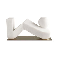 Deveraux Sculpture, shown in off-white and cream with cast stone, composite stone, and a freestanding weighted base.