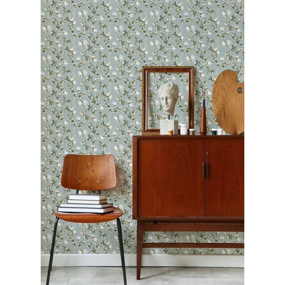 Rose Thorns Wallpaper, shown in sage green and ivory cream with paper, printed wallpaper, and full-wall surface covering.