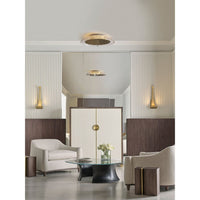 Alternate view of Scultura Cocktail Table, featuring satin finish, glass, metal, and circular glass tabletop.