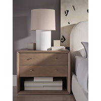 Additional view of Dias Cylinder Lamp in beige and white, featuring textured woven finish and table lamp form.