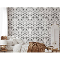 Boho Rain Wallpaper, shown in white and charcoal with paper and full-wall surface coverage.