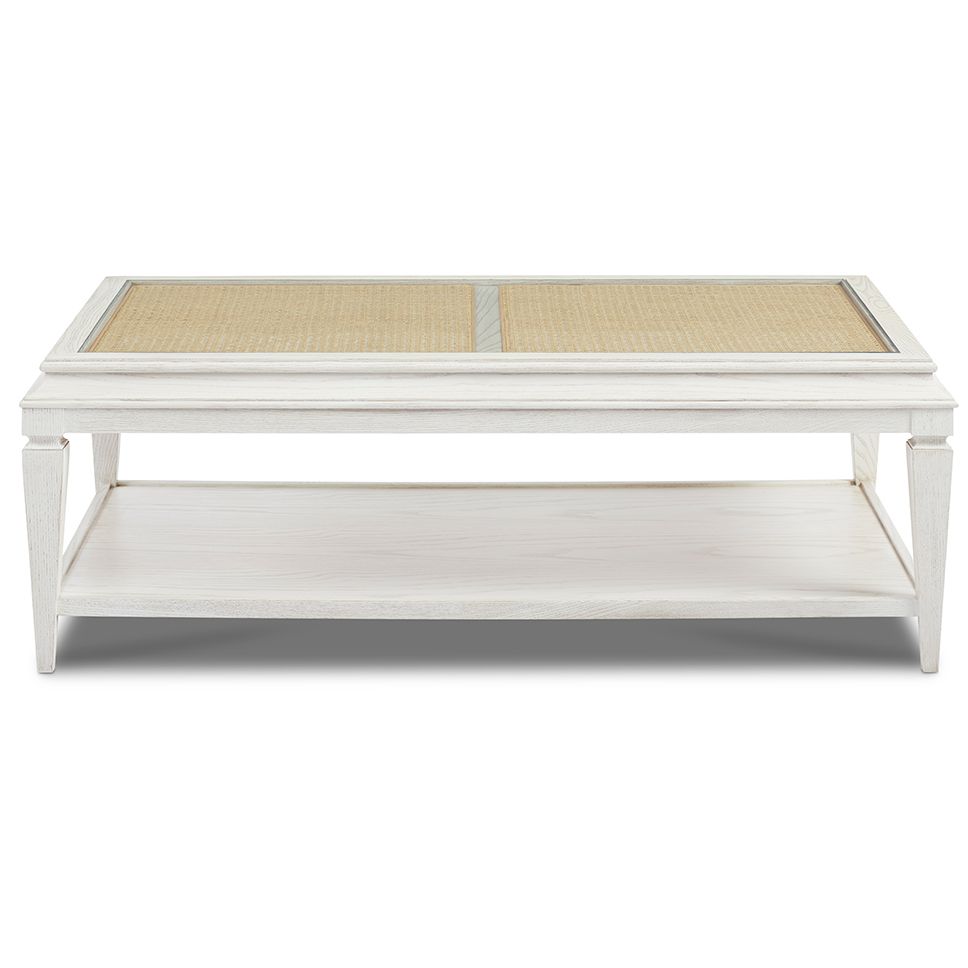 Dawson Rectangular Cocktail Table, shown in white and ivory with wood, cane, and integrated lower display shelf.