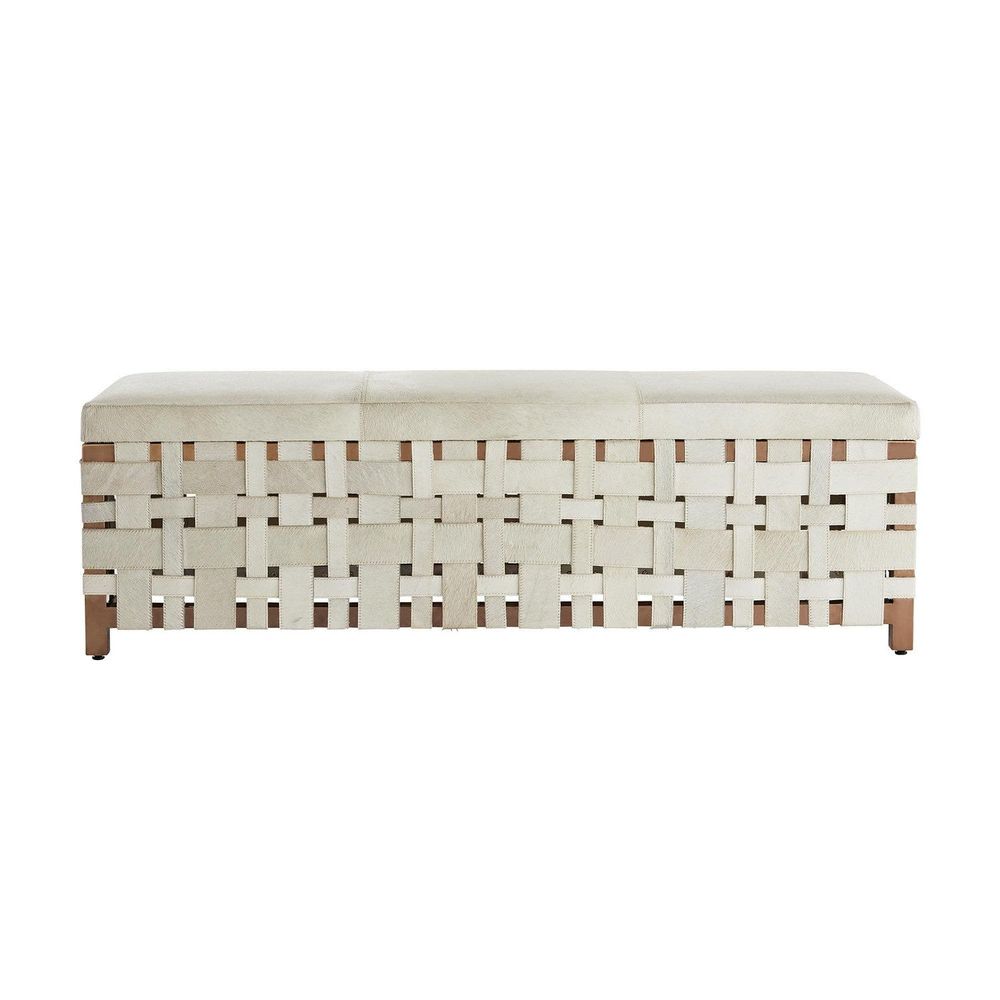Milo Bench, shown in ivory and off-white with cowhide, hide, and backless armless bench seating.