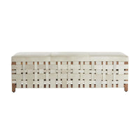 Milo Bench, shown in ivory and off-white with cowhide, hide, and backless armless bench seating.