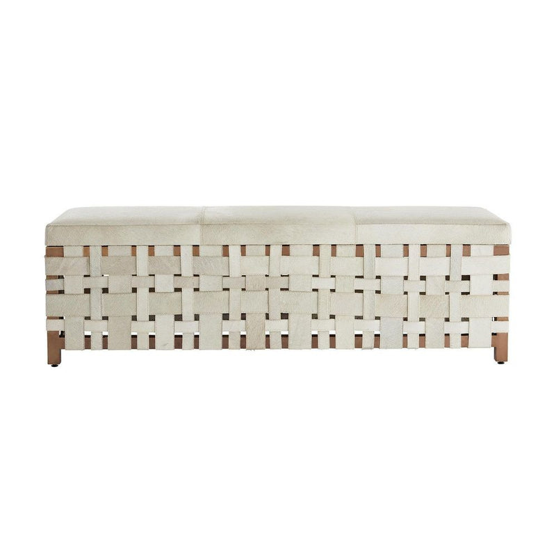 Milo Bench, shown in ivory and off-white with cowhide, hide, and backless armless bench seating.