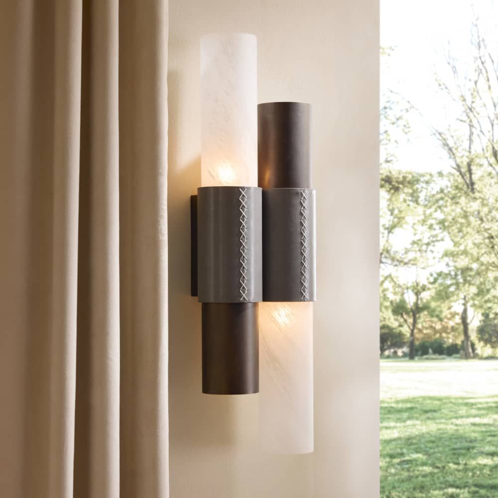 Alternate view of Wells Sconce, featuring translucent stone finish, metal, alabaster, and wall-mounting hardware.
