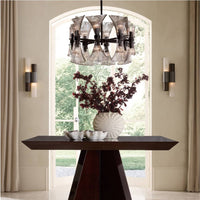 Additional view of Wells Sconce in bronze and charcoal gray, featuring translucent stone finish and wall-mounting hardware.
