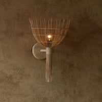 Alternate view of Ysella Sconce, featuring unfinished organic finish, rattan, cane, and a wall-mounting backplate.