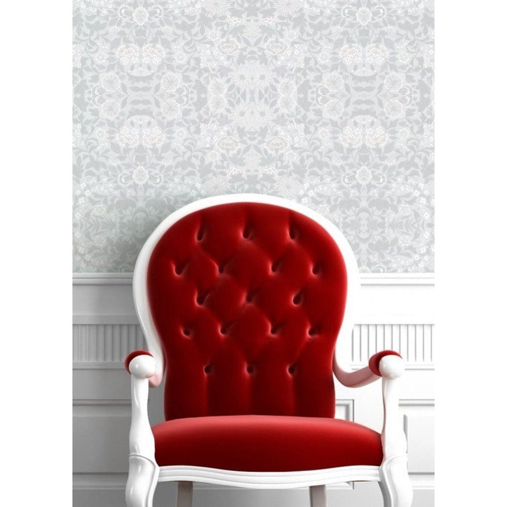Daisy Chain Wallpaper, shown in pale gray and sage green with paper and wall-covering sheet goods.
