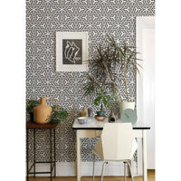 Twinkle Wallpaper, shown in charcoal gray and white with paper and full-wall surface covering.