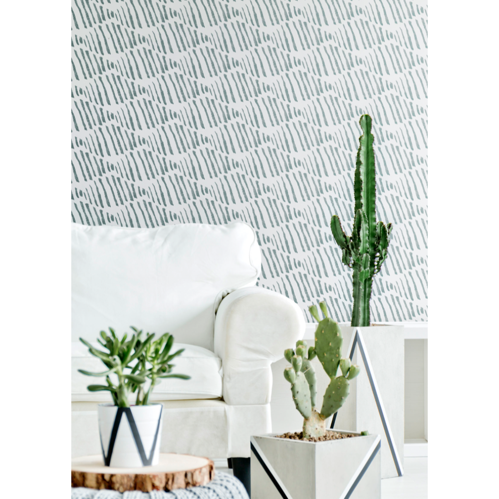 Diamond Back Juniper Wallpaper, shown in white and sage green with paper and wall-covering sheet goods.