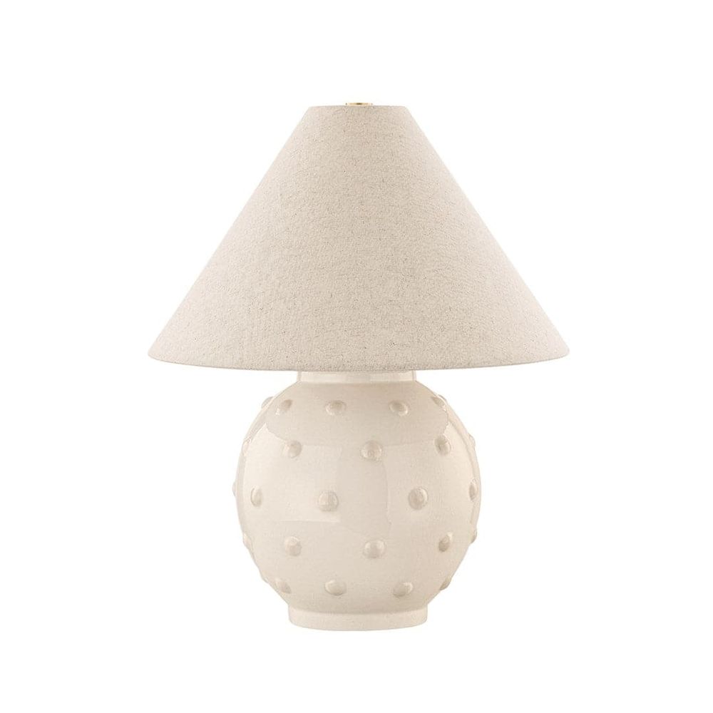 Annabelle Table Lamp, shown in ivory and cream with ceramic, linen fabric, and broad stable ceramic foot.