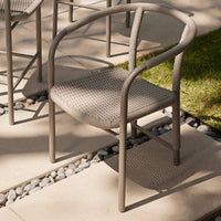 Alternate view of Balint Outdoor Dining Chair, featuring matte powder-coated, rope, metal, and fixed continuous arms.