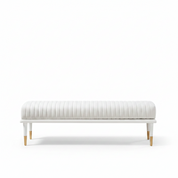 Stanford End-Of-Day Bench, shown in white with leather, wood, and backless armless bench.