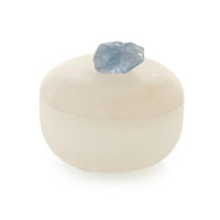 Earthborn Jar, Small, shown in ivory and cream with alabaster, celestite crystal, and removable lid.