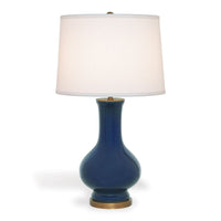 Dorothy Lamp, shown in navy blue and celadon with ceramic, fabric, and a freestanding table-lamp base.