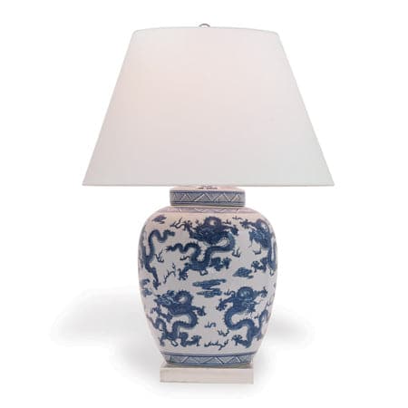 Dragon Navy Lamp, shown in white and blue with porcelain, fabric, and a hardback fabric shade.
