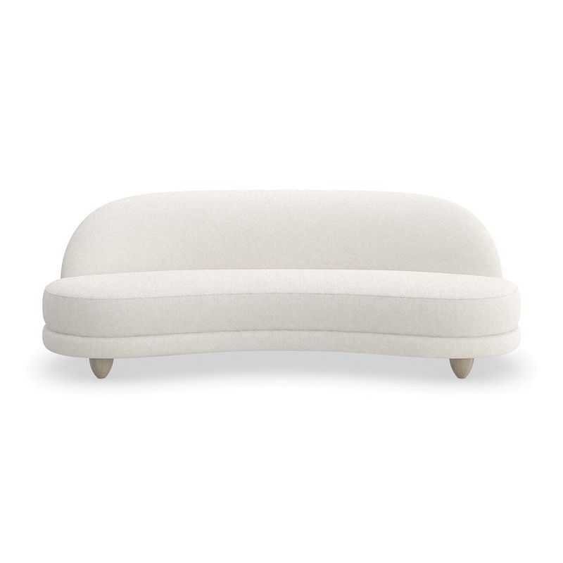Tova Sofa, shown in ivory and off-white with textured fabric, bouclé upholstery, and fixed short tapered wood legs.