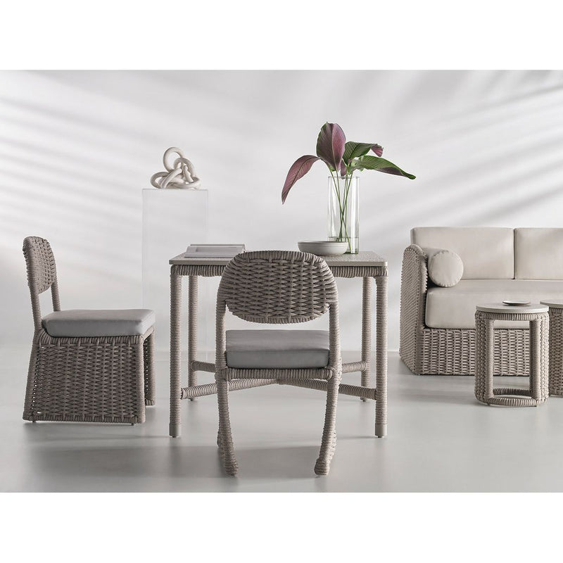 Alternate view of Cuerda Square Dining Table in warm taupe gray and light greige.