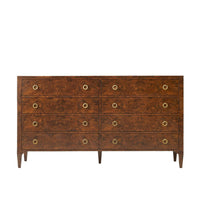 Walnut Burl Dresser, shown in warm medium-dark brown and amber-brown with walnut burl wood, brass, and eight-drawer storage.