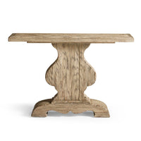 Sagehill Pedestal Console Table, shown in light natural wood and beige with solid wood and a single central pedestal base.