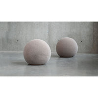 Alternate view of Mochi Ottoman Nude Knit Fabric in warm taupe-gray and light wood.