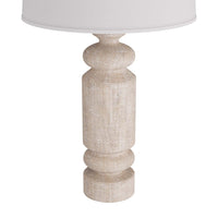 Additional view of Halecrest Lamp in light beige and warm taupe, featuring distressed and a table lamp base.