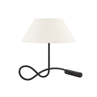 Alameda Table Lamp, shown in off-white and black with fabric, forged iron, and a tabletop freestanding base.