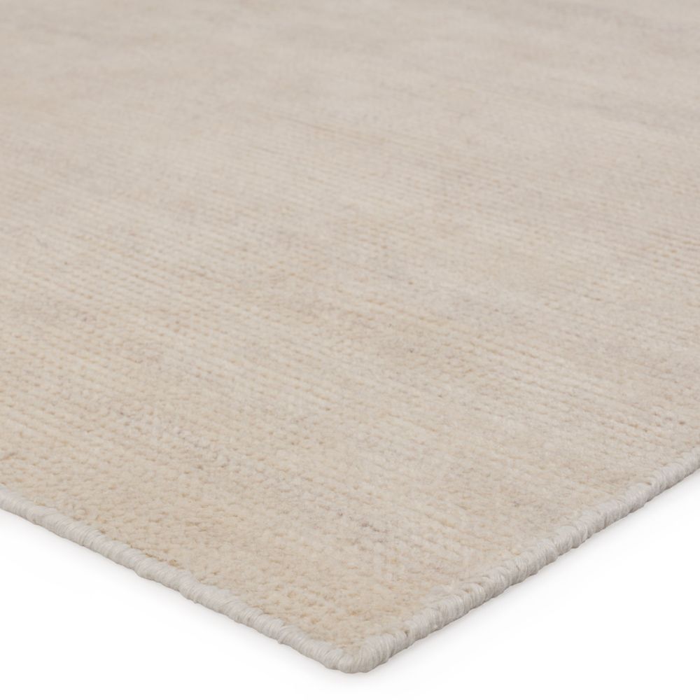 Alternate view of Henshaw Solid Cream/ Light Brown Area Rug (5'X8') in cream and light beige with rectangular flat area rug.