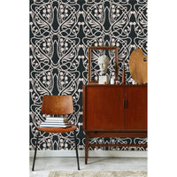 Vineyard Wallpaper, shown in charcoal black and blush pink with paper and printed substrate.
