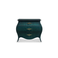 Corinna Bombe Chest, shown in deep teal and dark green-blue with wood, metal, and three stacked drawers.