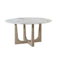 Alternate view of Repose Round Dining Table, featuring polished stone finish, quartz, oak, and round tabletop.