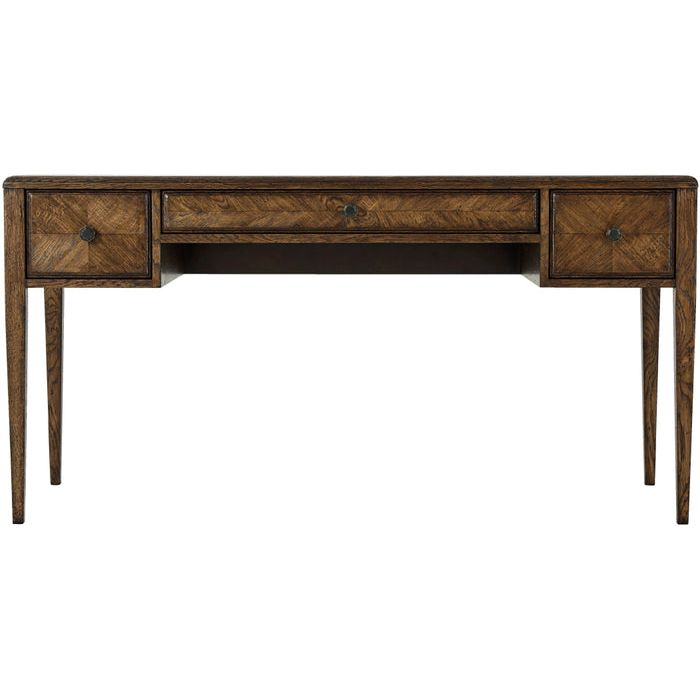 Nova Desk, shown in medium brown and warm oak brown with oak wood, wood veneer, and three drawers with round knobs.