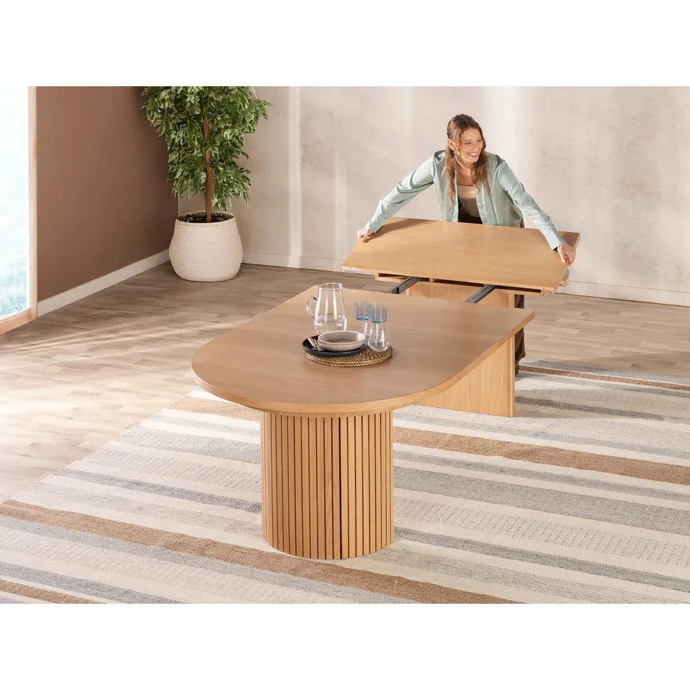 Alternate view of The Transformer Round Table in light oak and natural blonde wood.