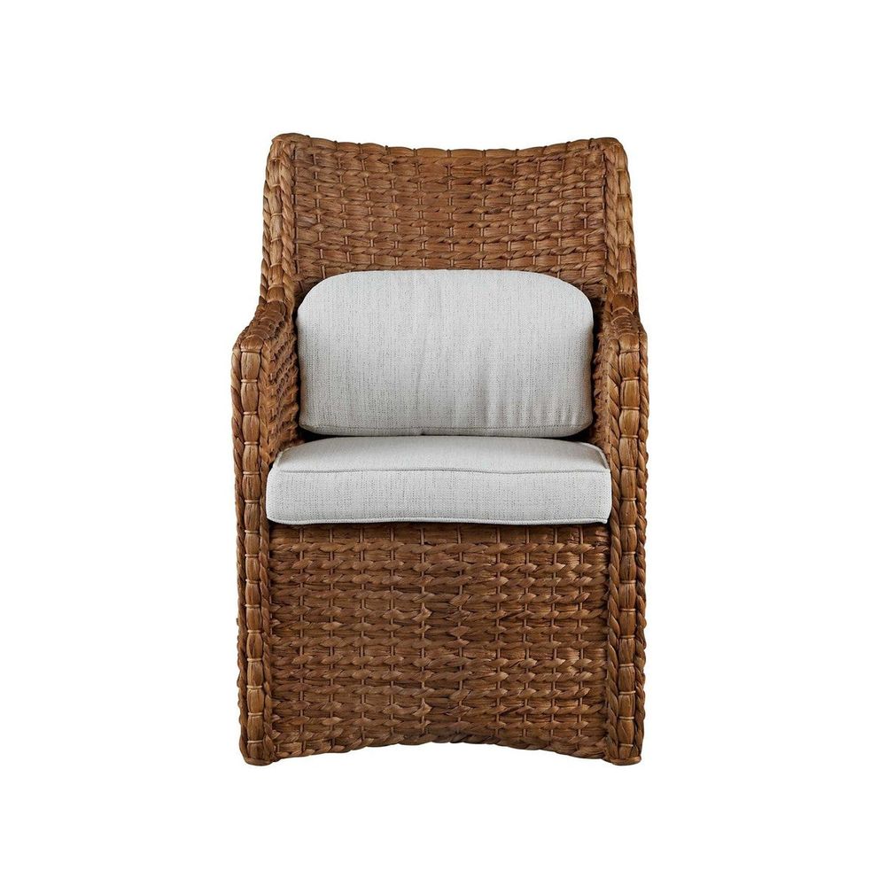 Montego Arm Chair, shown in warm brown and light gray with woven natural fiber, fabric, and fixed integrated arms.