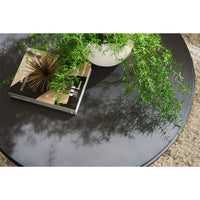 Additional view of Cinder Cocktail Table in charcoal and black, featuring matte finish and solid round tabletop.