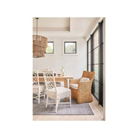 Additional view of Montego Arm Chair in warm brown and light gray, featuring matte textile finish and fixed integrated arms.