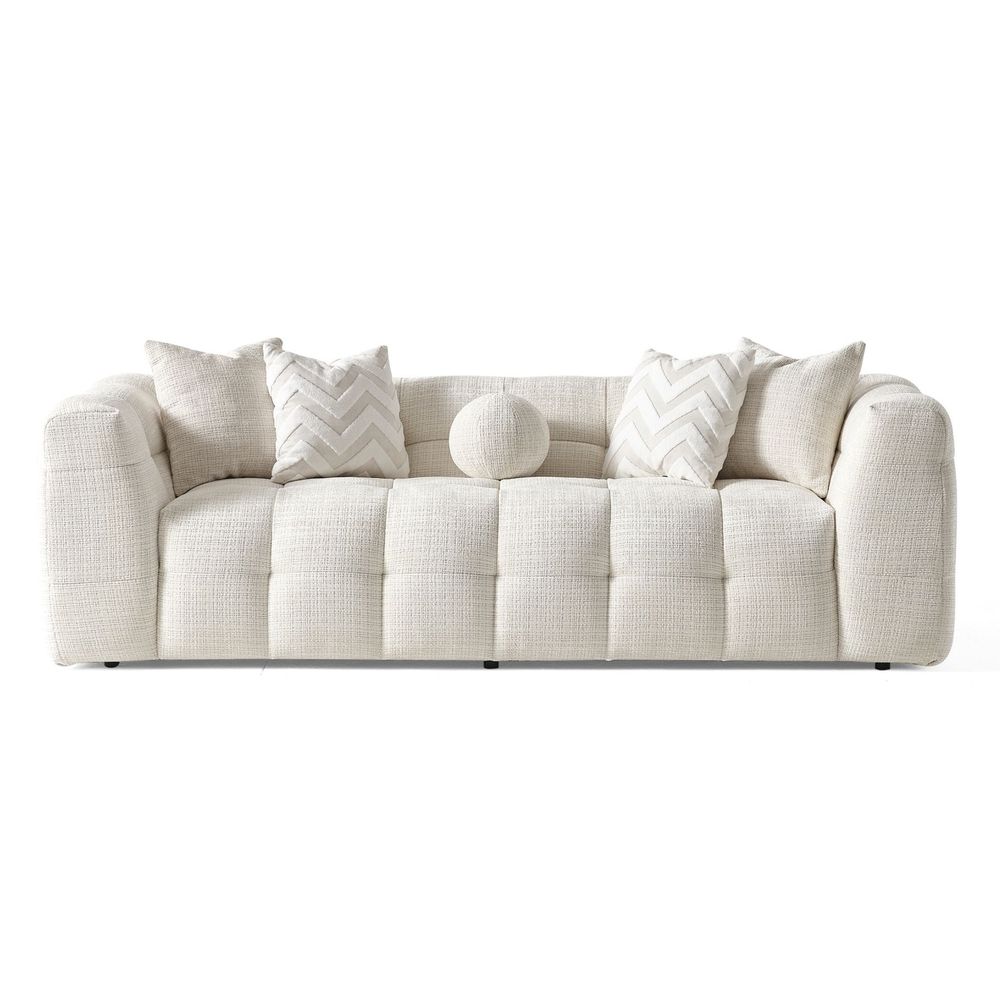 Cloud Sofa, shown in ivory and off-white with textured woven fabric, upholstery foam, and fixed rounded arms.