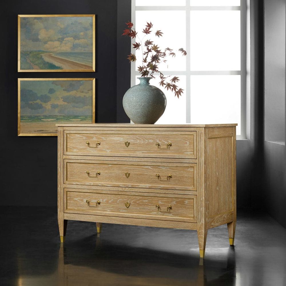 French Three Drawer Commode-Oak, shown in light oak and blonde wood with oak, brass, and three full-width drawers.