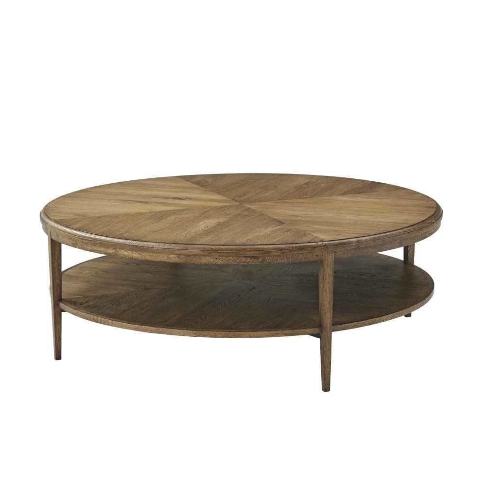 Nova Round Cocktail Table, shown in medium oak brown and warm honey brown with wood, oak, and two-tier open lower shelf.
