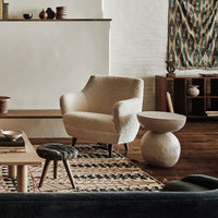 Additional view of Moulin Carved Sphere Side Table in white and off-white.