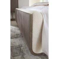 Additional view of Modern Mood King Upholstered Panel Bed in warm gray-brown wood and cream/ivory upholstery.
